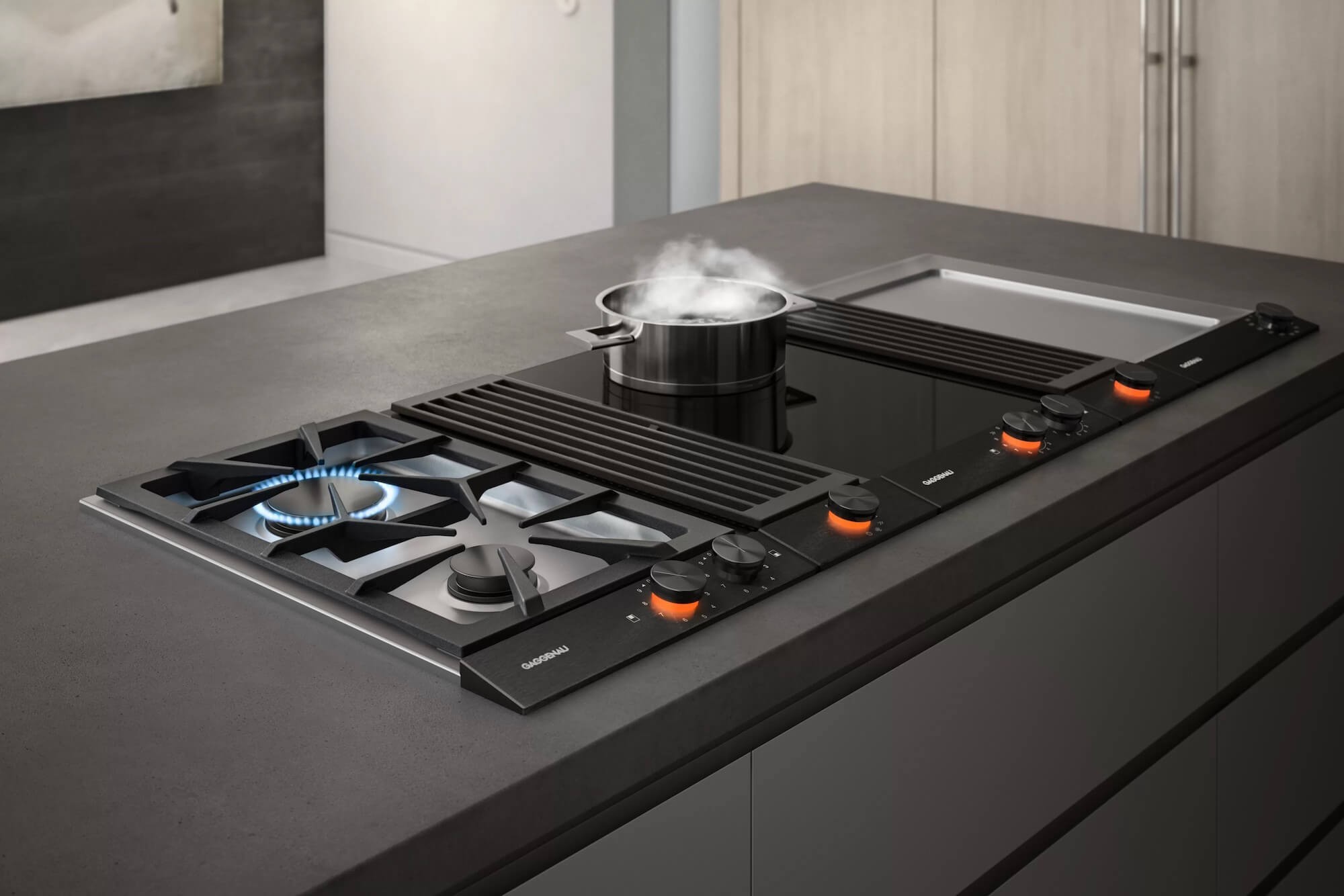 Gaggenau Vario Kochfelder mit Gas, Teppan Yaki und Induktion auf einer Kücheninsel