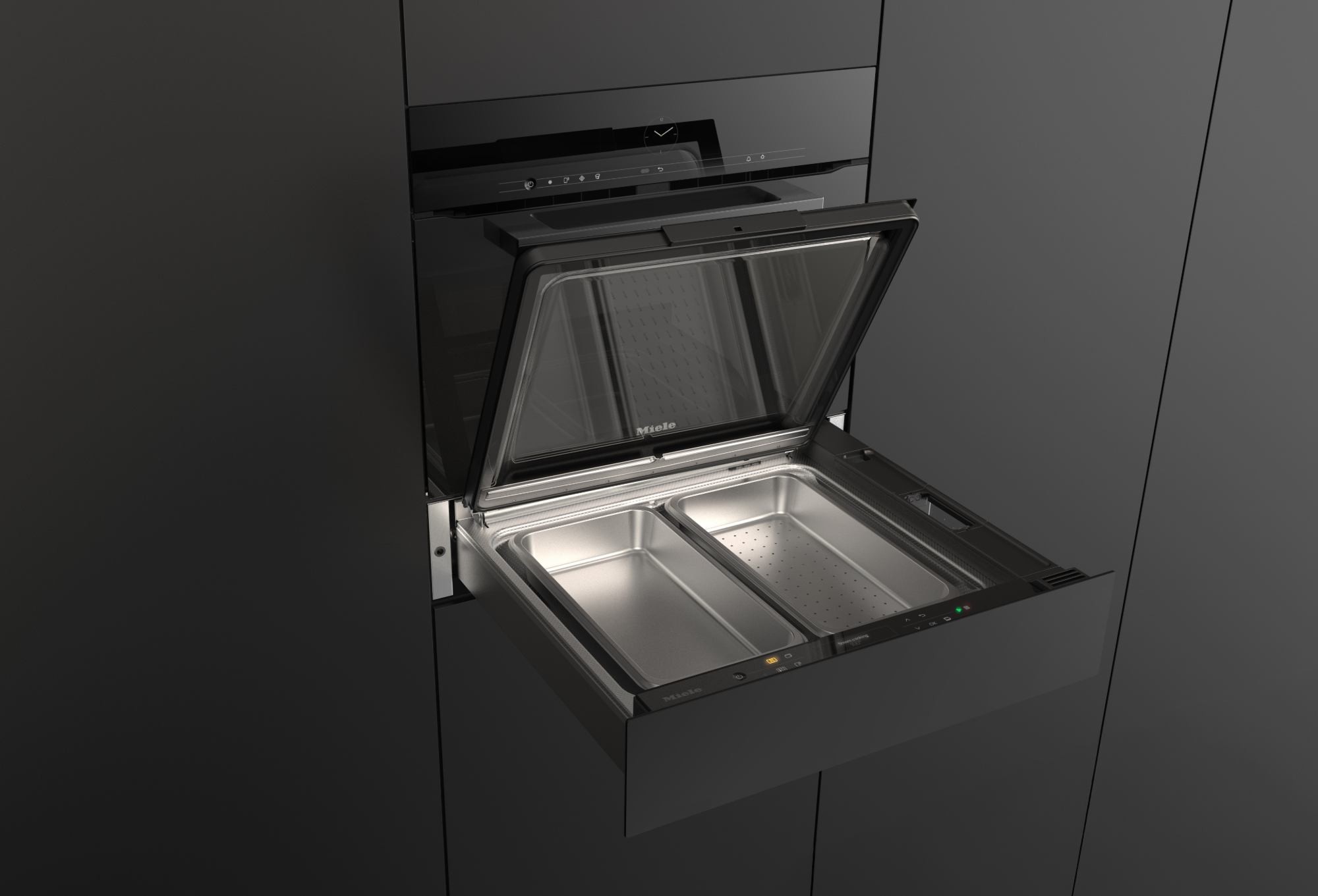 Miele Dampfgarschublade unter einem Backofen in einer schwarzen Küche